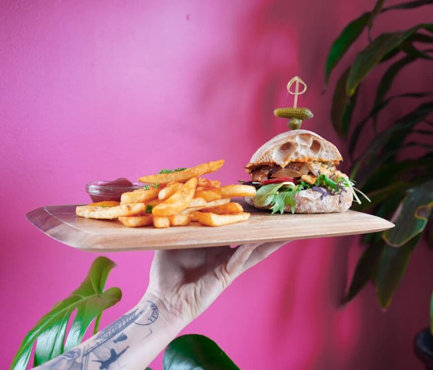 A platter of a vegan burger and fries